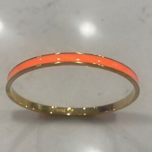 Orange and gold Sparks fly bangle bracelet by Kate Spade